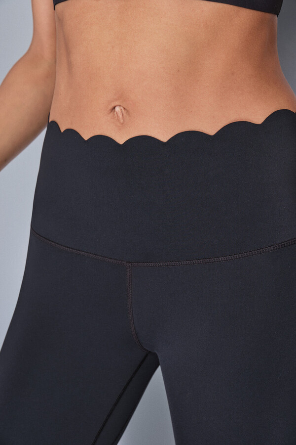 Dash and Stars Leggings compressivas capri pretas preto