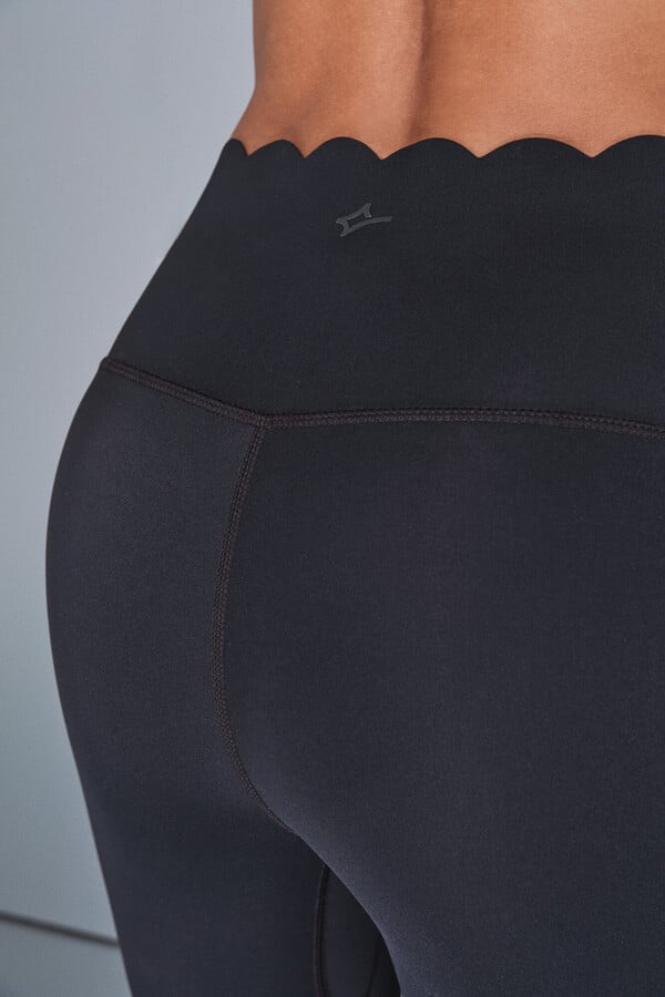 Dash and Stars Leggings compressivas capri pretas preto