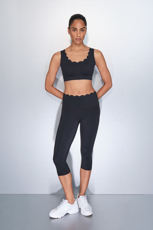 Dash and Stars Leggings compressivas capri pretas preto