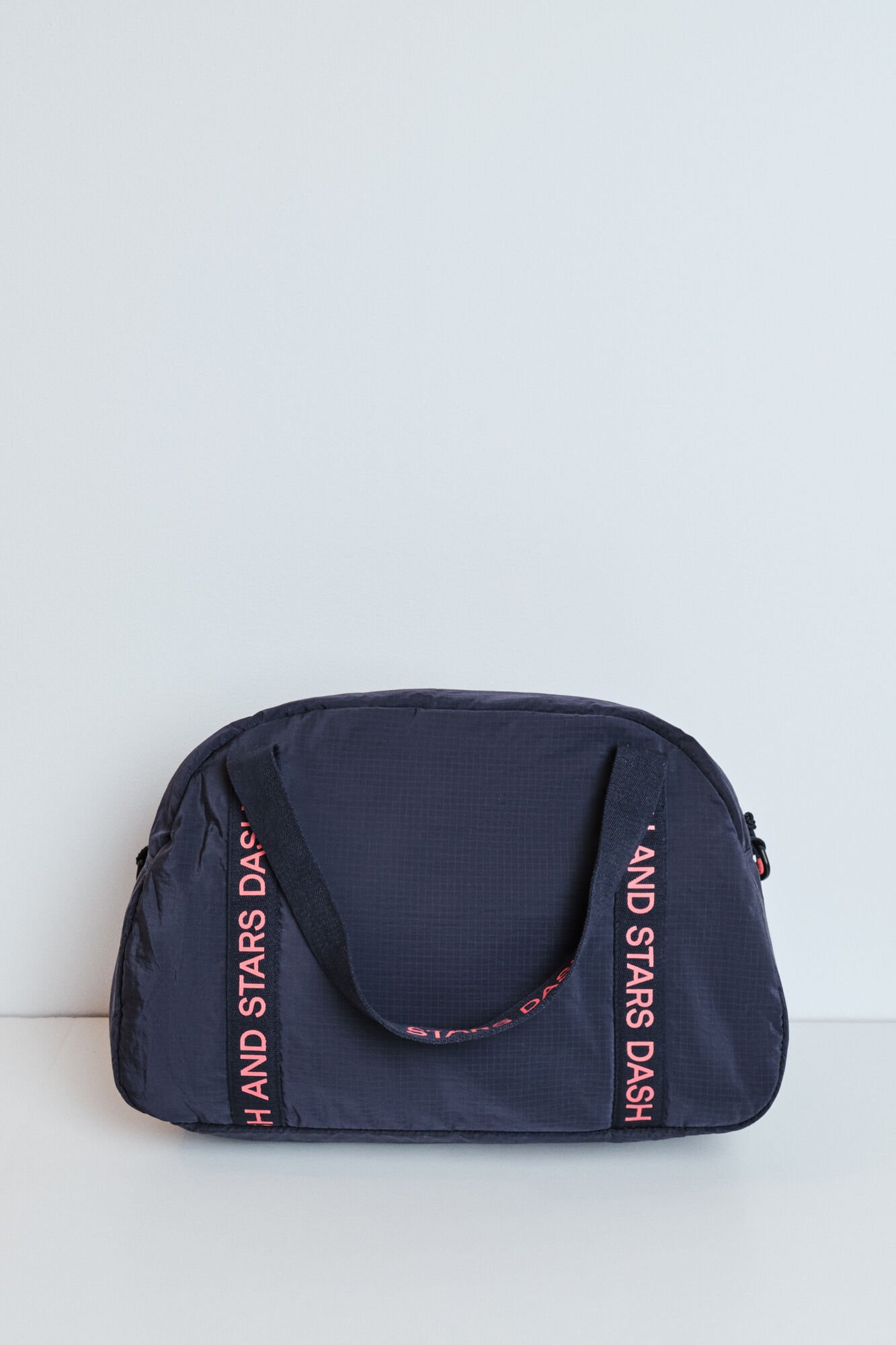 Dash and Stars Mala desportiva acolchoada em nylon