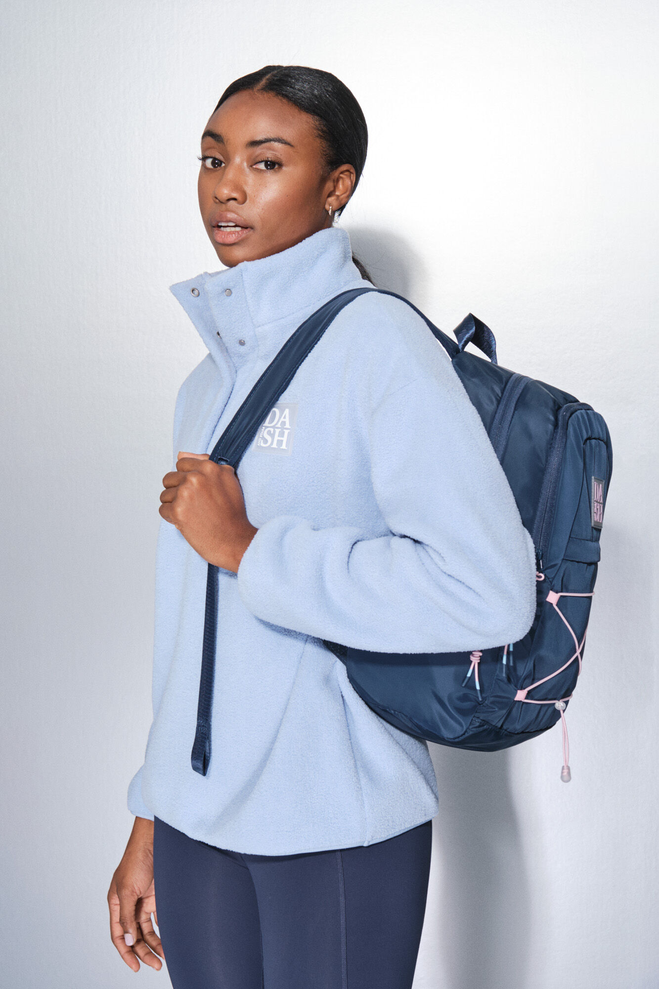 Dash and Stars Mochila esportiva azul com el&aacute;sticos rosa