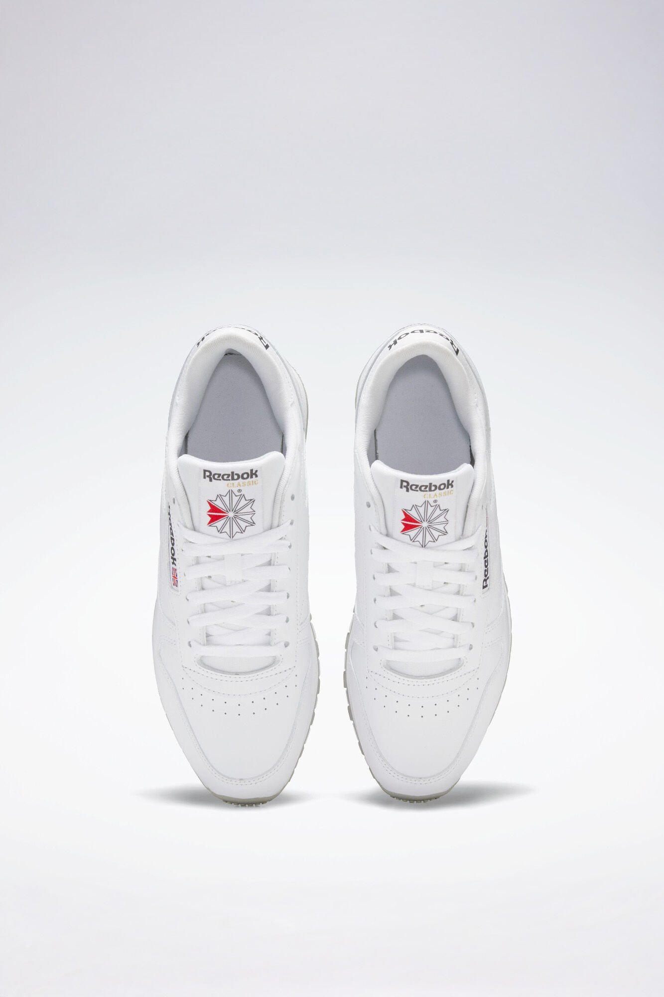 Reebok T&ecirc;nis desportiva de couro Reebok Classic branco